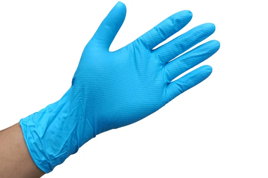 Nitrile medical gloves being worn for safety and hygiene purposes.