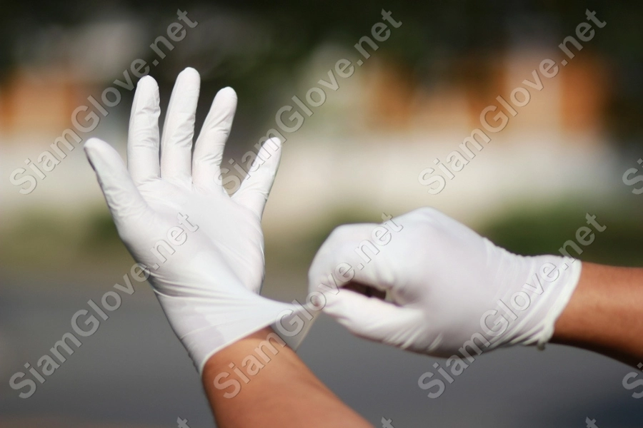 Blue disposable medical glove for health and laboratory use.