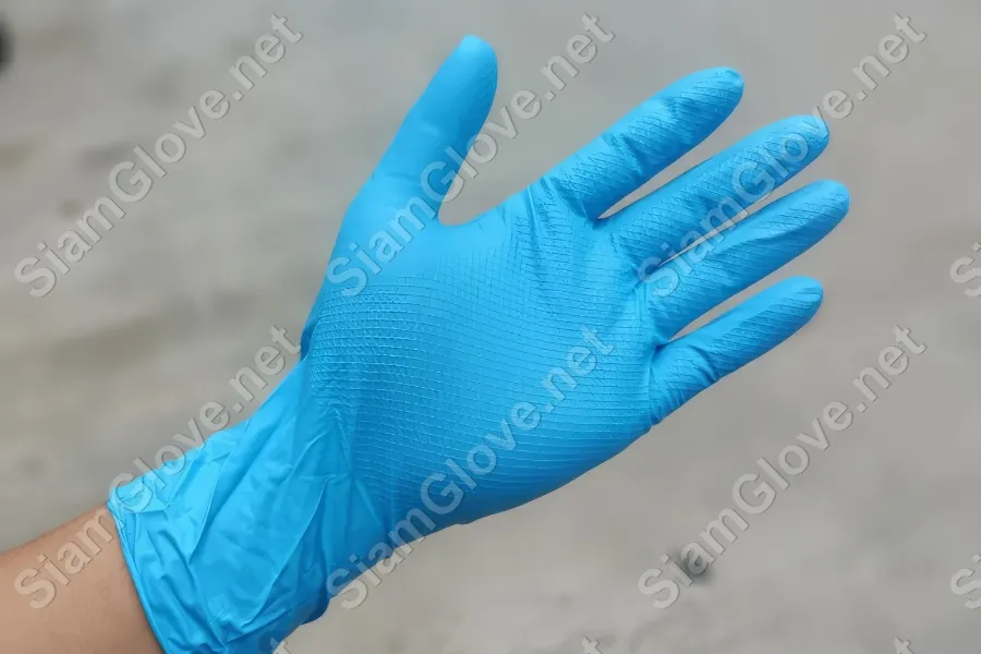 Blue disposable medical glove for health and laboratory use.